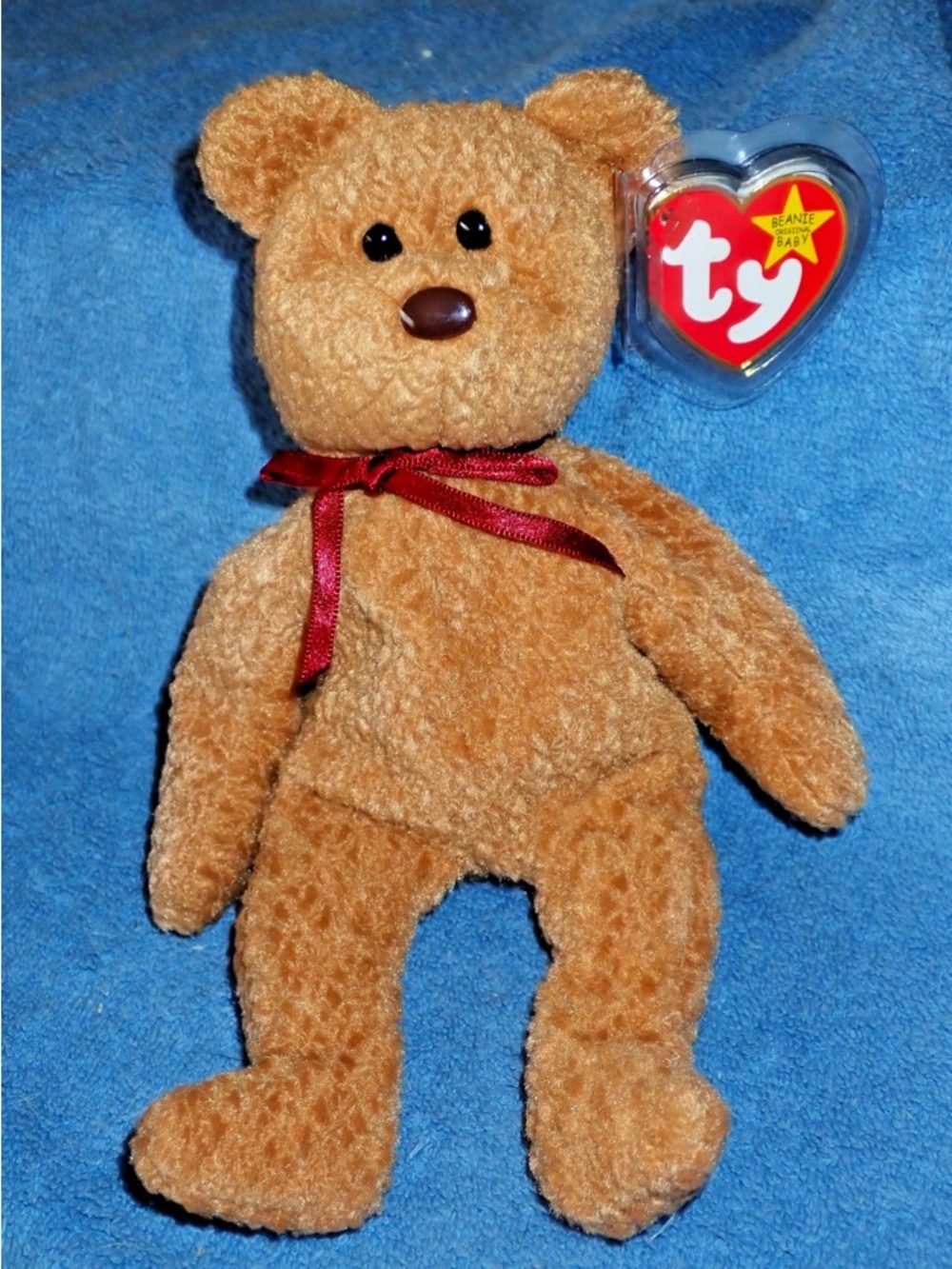 TY Beanie Baby Curly  Brown Teddy Bear Plush Toy with Red Ribbon. New